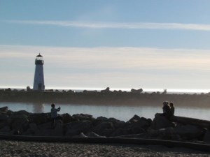 Grandmother taking photo of kids