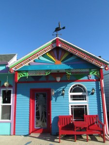 Rainbow house with a mermaid door