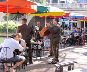mariachi band serenading a family